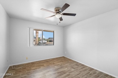 What a gem in Sun City! This home sits on a prime north/south on Sun City South Golf Course in Arizona - for sale on GolfHomes.com, golf home, golf lot