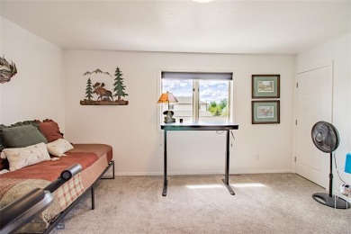 Welcome home to this low maintenance townhouse in Meadowlark on Butte Country Club in Montana - for sale on GolfHomes.com, golf home, golf lot