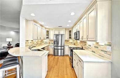 SIMPLY PERFECT! LONG LAKE VIEWS where nothing is out of place on Bonita Bay West in Florida - for sale on GolfHomes.com, golf home, golf lot