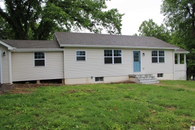This beautifully renovated home has been completely gutted and on Benton Golf and Country Club in Kentucky - for sale on GolfHomes.com, golf home, golf lot