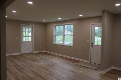 This beautifully renovated home has been completely gutted and on Benton Golf and Country Club in Kentucky - for sale on GolfHomes.com, golf home, golf lot