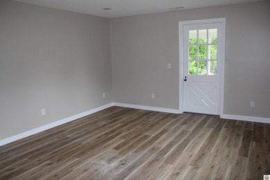 This beautifully renovated home has been completely gutted and on Benton Golf and Country Club in Kentucky - for sale on GolfHomes.com, golf home, golf lot
