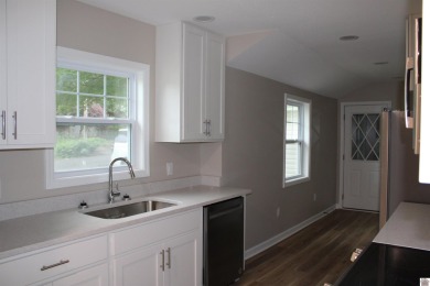 This beautifully renovated home has been completely gutted and on Benton Golf and Country Club in Kentucky - for sale on GolfHomes.com, golf home, golf lot