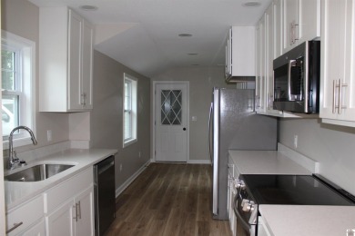 This beautifully renovated home has been completely gutted and on Benton Golf and Country Club in Kentucky - for sale on GolfHomes.com, golf home, golf lot