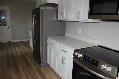 This beautifully renovated home has been completely gutted and on Benton Golf and Country Club in Kentucky - for sale on GolfHomes.com, golf home, golf lot