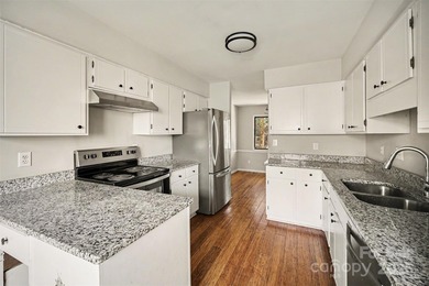 Welcome to this peaceful single-story townhome perfectly between on Raintree Country Club in North Carolina - for sale on GolfHomes.com, golf home, golf lot