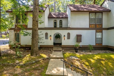 Perfectly Move-In Ready! Step into Spanish-style charm in this on DeSoto Golf Course in Arkansas - for sale on GolfHomes.com, golf home, golf lot