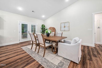 Enjoy one-level living in this beautifully crafted custom ranch on River Golf and Country Club at Lake Royale in North Carolina - for sale on GolfHomes.com, golf home, golf lot
