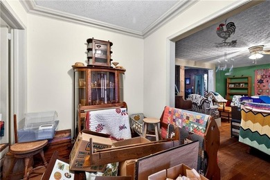 Nestled on one of the largest residential lots in the charming on College Park Municipal Golf Course in Georgia - for sale on GolfHomes.com, golf home, golf lot