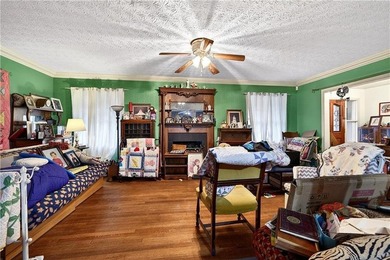 Nestled on one of the largest residential lots in the charming on College Park Municipal Golf Course in Georgia - for sale on GolfHomes.com, golf home, golf lot