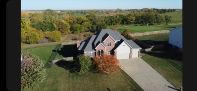 Picture perfect brick appeal,5-bed,(master on main,3 bed -1 bath on The Golf Club At Table Creek in Nebraska - for sale on GolfHomes.com, golf home, golf lot