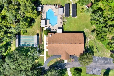 Under contract-accepting backup offers. Charming and on Sun Air Golf Course in Florida - for sale on GolfHomes.com, golf home, golf lot