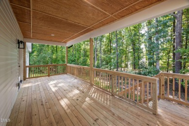 Enjoy one-level living in this beautifully crafted custom ranch on River Golf and Country Club at Lake Royale in North Carolina - for sale on GolfHomes.com, golf home, golf lot