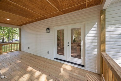 Enjoy one-level living in this beautifully crafted custom ranch on River Golf and Country Club at Lake Royale in North Carolina - for sale on GolfHomes.com, golf home, golf lot