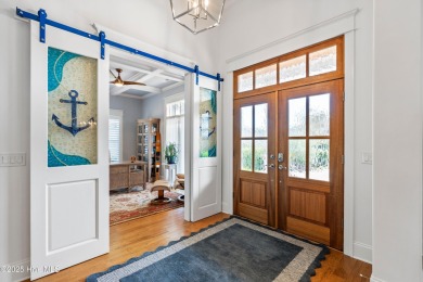 Welcome to 517 Moss Tree Drive - a charming and thoughtfully on Country Club of Landfall in North Carolina - for sale on GolfHomes.com, golf home, golf lot