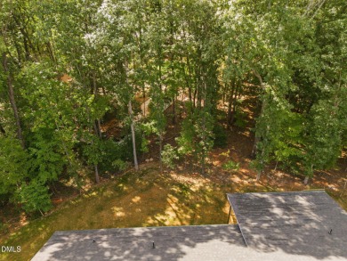 Enjoy one-level living in this beautifully crafted custom ranch on River Golf and Country Club at Lake Royale in North Carolina - for sale on GolfHomes.com, golf home, golf lot