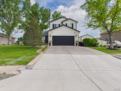 Experience luxury and comfort in this beautiful 2-story home on Desert Hawk At Pueblo West in Colorado - for sale on GolfHomes.com, golf home, golf lot