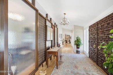 Vaulted ceilings and sunlit interiors define this elegant on The Deerwood Country Club in Florida - for sale on GolfHomes.com, golf home, golf lot