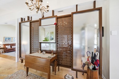 Vaulted ceilings and sunlit interiors define this elegant on The Deerwood Country Club in Florida - for sale on GolfHomes.com, golf home, golf lot