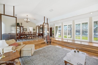 Vaulted ceilings and sunlit interiors define this elegant on The Deerwood Country Club in Florida - for sale on GolfHomes.com, golf home, golf lot