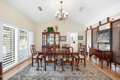 Vaulted ceilings and sunlit interiors define this elegant on The Deerwood Country Club in Florida - for sale on GolfHomes.com, golf home, golf lot