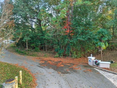 Build your dream home on this beautiful 0.39 acre lot cul-de-sac on Diamondhead Country Club in Mississippi - for sale on GolfHomes.com, golf home, golf lot