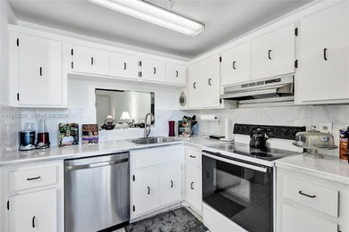 Step into comfort and style with this beautifully updated on Inverrary Country Club in Florida - for sale on GolfHomes.com, golf home, golf lot