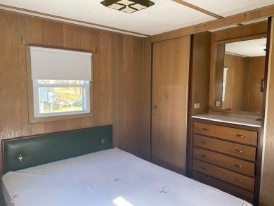 If you are looking for a lovely view, this mobile home with on Bear Creek Lodge Golf Course in New York - for sale on GolfHomes.com, golf home, golf lot