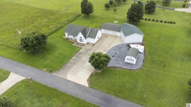 Perfect turn-key starter home or ideal for downsizing! Enjoy on Calvert City Golf and Country Club in Kentucky - for sale on GolfHomes.com, golf home, golf lot