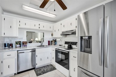 Step into comfort and style with this beautifully updated on Inverrary Country Club in Florida - for sale on GolfHomes.com, golf home, golf lot