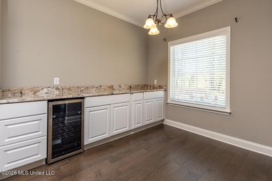 Welcome to this beautifully crafted 4-bedroom, 2-bath home built on Wedgewood Golfers Club in Mississippi - for sale on GolfHomes.com, golf home, golf lot