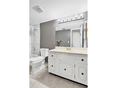 Step into comfort and style with this beautifully updated on Inverrary Country Club in Florida - for sale on GolfHomes.com, golf home, golf lot