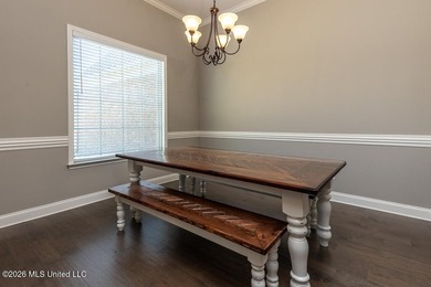 Welcome to this beautifully crafted 4-bedroom, 2-bath home built on Wedgewood Golfers Club in Mississippi - for sale on GolfHomes.com, golf home, golf lot