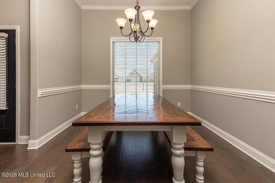 Welcome to this beautifully crafted 4-bedroom, 2-bath home built on Wedgewood Golfers Club in Mississippi - for sale on GolfHomes.com, golf home, golf lot