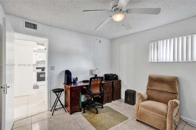 Step into comfort and style with this beautifully updated on Inverrary Country Club in Florida - for sale on GolfHomes.com, golf home, golf lot