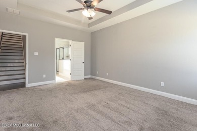 Welcome to this beautifully crafted 4-bedroom, 2-bath home built on Wedgewood Golfers Club in Mississippi - for sale on GolfHomes.com, golf home, golf lot