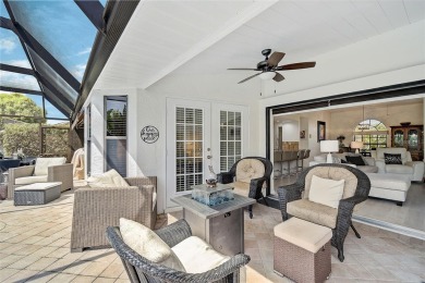 Welcome to your private sanctuary! Double front doors add to the on Peridia Golf and Country Club in Florida - for sale on GolfHomes.com, golf home, golf lot