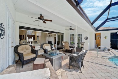 Welcome to your private sanctuary! Double front doors add to the on Peridia Golf and Country Club in Florida - for sale on GolfHomes.com, golf home, golf lot