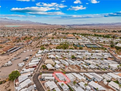 Enjoy comfortable, resort-style living in this fully furnished on Riverview Golf Course in Arizona - for sale on GolfHomes.com, golf home, golf lot