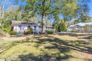 Your Dream Sunset Beach Cottage is here! Come now to view this on Oyster Bay Golf Links in North Carolina - for sale on GolfHomes.com, golf home, golf lot