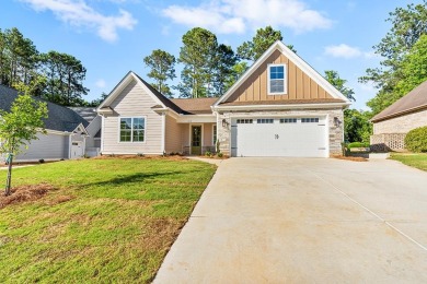 Luxury Living in Grand Harbor's Premier Lake & Golf Community! on The Patriot Golf Club At Grand Harbor in South Carolina - for sale on GolfHomes.com, golf home, golf lot