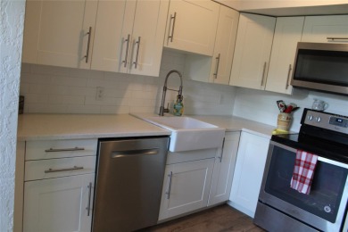 FIRST FLOOR GEM****A wonderfully updated condo that let's you on On Top Of The World Golf Course in Florida - for sale on GolfHomes.com, golf home, golf lot