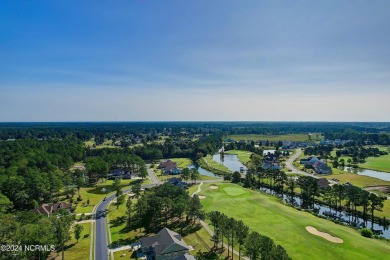 Welcome to coastal living at its finest in Crow Creek! This on Crow Creek Golf Club in North Carolina - for sale on GolfHomes.com, golf home, golf lot