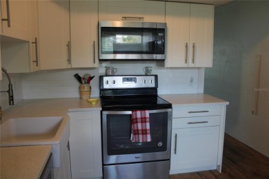FIRST FLOOR GEM****A wonderfully updated condo that let's you on On Top Of The World Golf Course in Florida - for sale on GolfHomes.com, golf home, golf lot
