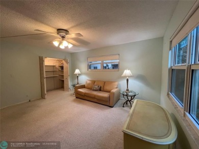 BACK ON MARKET 2nd FLOOR CORNER with WIDE GOLF/LAKE/POOL VIEW on Wynmoor Golf Course in Florida - for sale on GolfHomes.com, golf home, golf lot