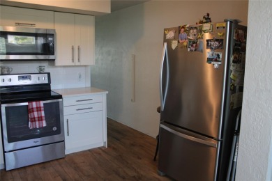 FIRST FLOOR GEM****A wonderfully updated condo that let's you on On Top Of The World Golf Course in Florida - for sale on GolfHomes.com, golf home, golf lot
