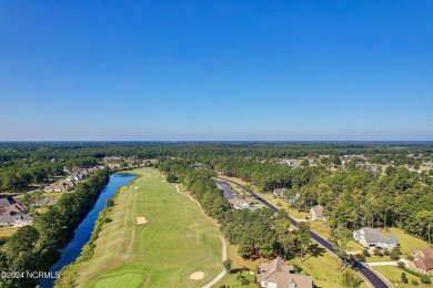 Welcome to coastal living at its finest in Crow Creek! This on Crow Creek Golf Club in North Carolina - for sale on GolfHomes.com, golf home, golf lot