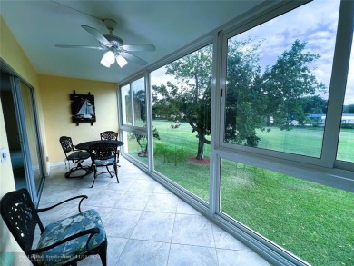 BACK ON MARKET 2nd FLOOR CORNER with WIDE GOLF/LAKE/POOL VIEW on Wynmoor Golf Course in Florida - for sale on GolfHomes.com, golf home, golf lot