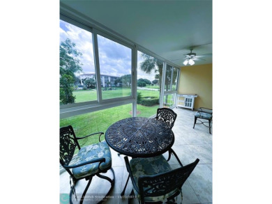 BACK ON MARKET 2nd FLOOR CORNER with WIDE GOLF/LAKE/POOL VIEW on Wynmoor Golf Course in Florida - for sale on GolfHomes.com, golf home, golf lot
