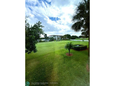 BACK ON MARKET 2nd FLOOR CORNER with WIDE GOLF/LAKE/POOL VIEW on Wynmoor Golf Course in Florida - for sale on GolfHomes.com, golf home, golf lot